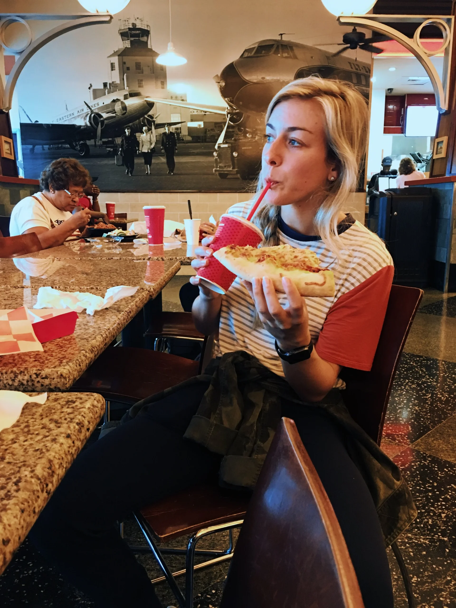   On a layover in Houston Hobby – peacefully eating my pizza and drinking Coke, knowing that my robo-managed investment funds were taken care of without me lifting a finger.  
